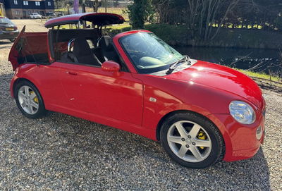 Daihatsu Copen - Front, opération de toit